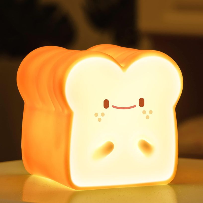 Cosy and adorable squishy silicon lamp shaped like a toast with a cute little smile.