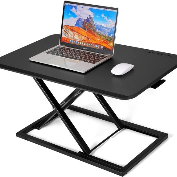 Small and simple looking black desk converter with a laptop and mouse on top.